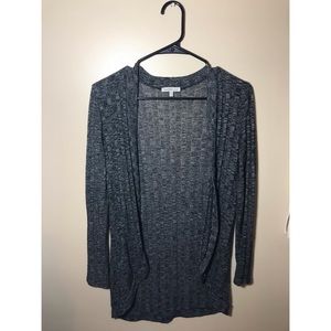 Black/grey/white spec sweater.